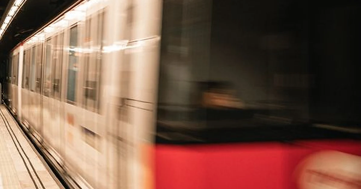 Metro subway train arriving at station platform